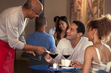 man paying for date, date night, couple